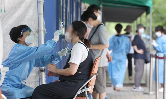 韩国拟明日起对新冠实施流感同级管理 检查费用需本人承担