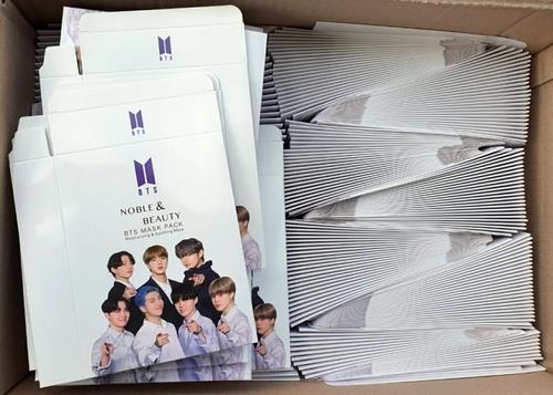 S. Koreas customs office receives appreciation plaque for cracking down on fake BTS masks packs