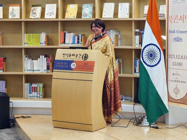 Ms Surabhi Amit Kumar spouse of Mr Amit Kumar the Indian Ambassador to South Korea speaks about Indian cuisine during her lecture presentation that took place in central Seoul on December 8 2023Photograph by Park Sae-jin