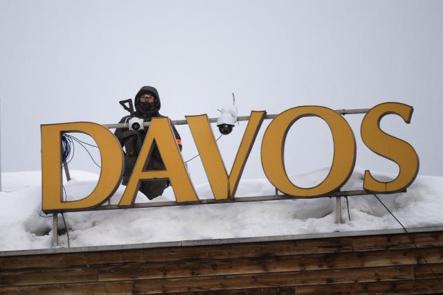 epa11079675 Special police is on guard on the roof of the congress hotel during the first day of the 54th annual meeting of the World Economic Forum WEF in Davos Switzerland 
