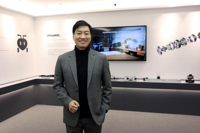 ROBOTIS CEO Kim Byung-soo poses for a photoshoot in the lobby of ROBOTIS headquarters building located in southwestern Seoul Courtesy of ROBOTIS