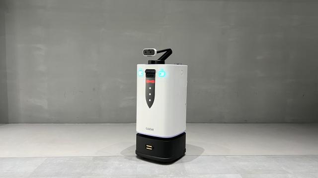 The indoor version of Gaemi a service robot developed by South Korean robotics company ROBOTIS can use its actuator like a human hand to press elevator buttons and knock on doors Courtesy of ROBOTIS