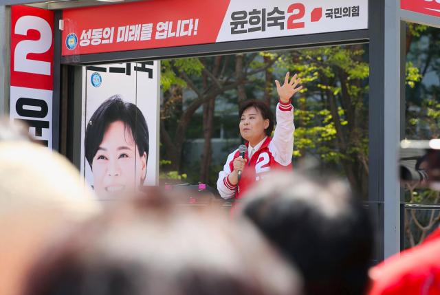 Yoon Hee-Suk a People’s Power Party candidate delivers a campaign speech at the Wangsimni Square Seongdong-gu Seoul April 9 2024 AJU PRESS Han Jun-gu