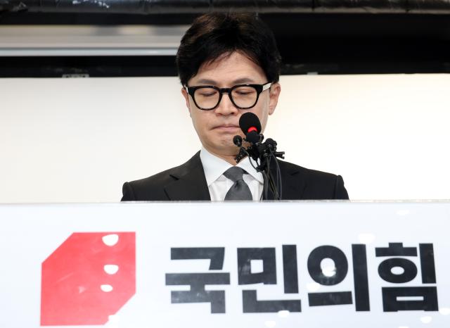 Han Dong-hoon holds a press conference to announce his resignation as the People Power Party interim leader at the National Assembly in Seoul on Thursday YONHAP PHOTO