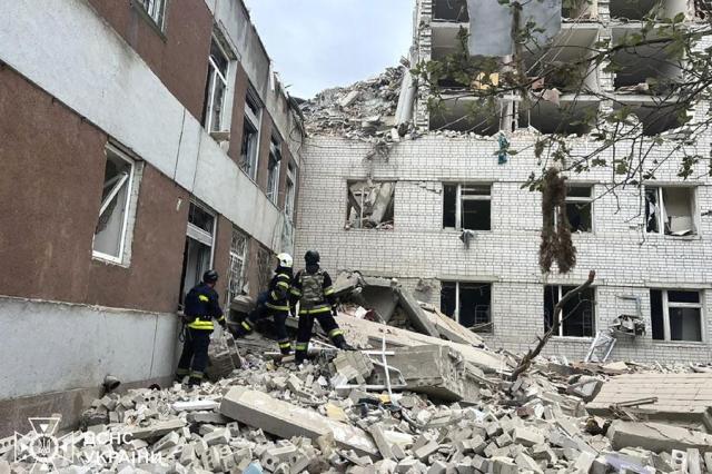 In this photo provided by the Ukrainian Emergency Service rescuers work at the site of a Russian missile strike in Chernihiv Ukraine on Wednesday AP-Yonhap