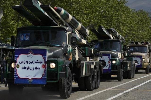 Missiles are carried on trucks during Army Day parade at a military base in northern Tehran Iran on April 17 2024 AP-Yonhap