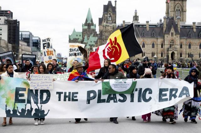 People take part in a March to End the Plastic Era rally on Parliament Hill in Ottawa Ontario on April 21 2024 The fourth session of the Intergovernmental Negotiating Committee INC is set to take place in the nations capital as delegates from 176 countries work to negotiate a treaty to eliminate plastic waste in less than 20 years AP-Yonhap