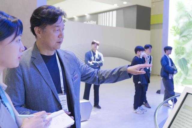 Kim Gun-woo chief of the Smart Mobility Cell in the Advanced Research Sector at Hyundai Mobis explains the company’s new electric vehicle MOBION at the 37th International Electric Vehicle Symposium and Exhibition EVS37 at COEX in Seoul on April 24 2024 AJU PRESS Park Jong-hyeok