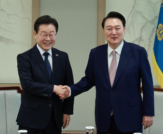 Lee Jae-myung the leader of the main opposition Democratic Party talks with President Yoon Suk Yul at the presidential office in Yongsan Yonhap