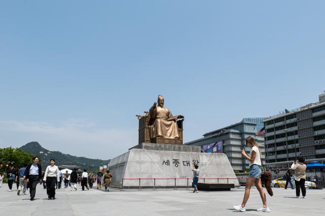 Foreigners pass by Gwanghwamun Square in central Seoul on May 9 2024 AJU PRESS Park Jong-hyeok