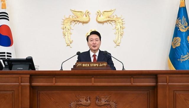 President Yoon Suk Yeol delivers a televised address ahead of a press conference in his office in Yongsan Seoul Thursday Yonhap