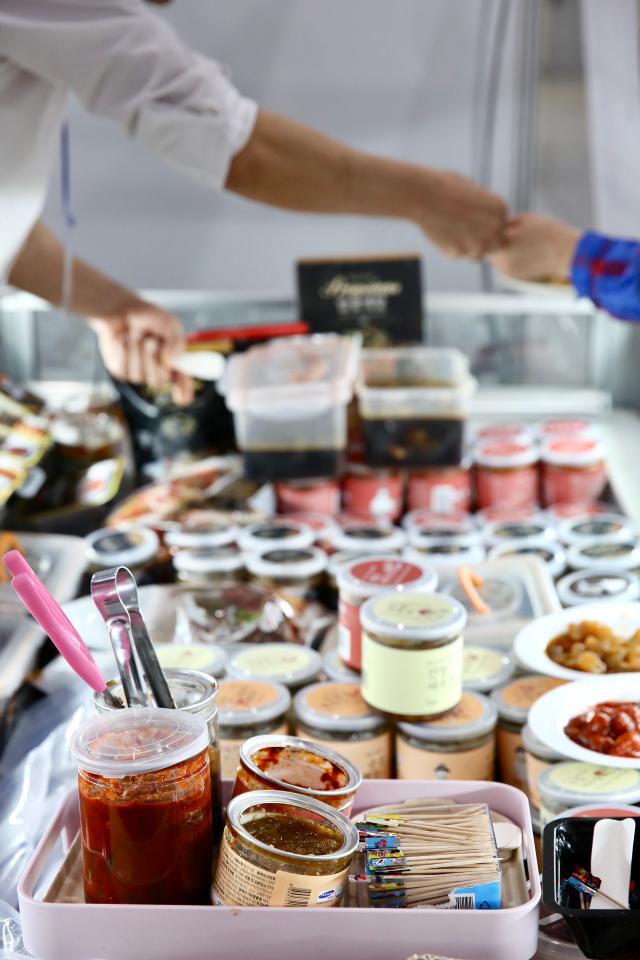 Various types of seasoned raw crab are displayed at the Seoul Seafood Show at COEX on May 16 2024 AJU PRESS Han Jun-gu