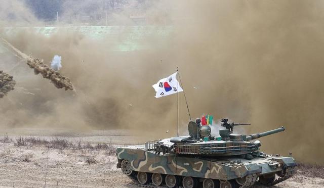 A South Korean battle tank fires a round during a joint training with the US in Gyeonggi Province in this file photo taken in March 2024