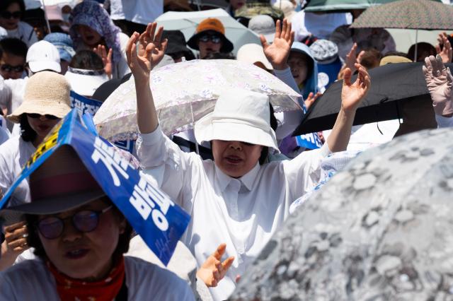 Participants take part in a joint worship opposing the Seoul Queer Culture Festival on the road near the city hall in Jung-gu Seoul on June 1 2024 AJU PRESS Park Jong-hyeok