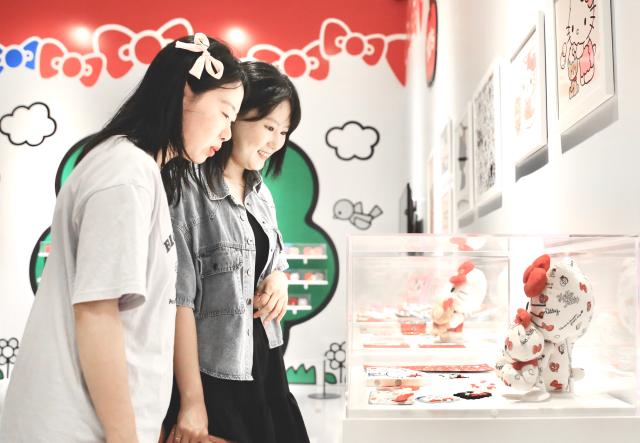 Visitors view exhibits at the Hello Kitty 50th Anniversary Special Exhibition hold at the DDP on June 3 2024 AJU PRESS Han Jun-gu