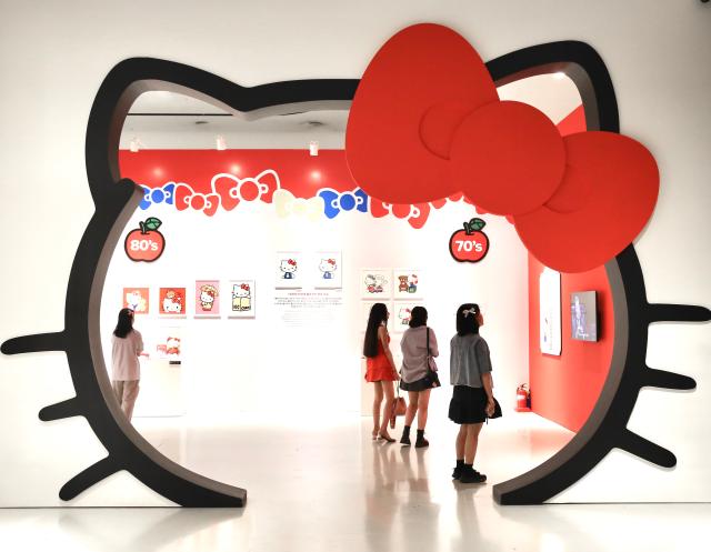 A Hello Kitty-shaped tunnel is installed at the Hello Kitty 50th Anniversary Special Exhibition hold at the DDP on June 3 2024