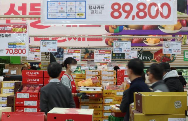 People shop at a large store in Seoul in this undated photo Yonhap