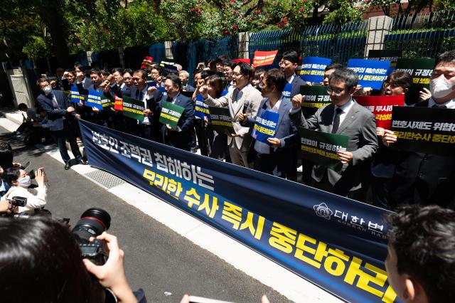 Members of the Korean Bar Association chant slogans AJU PRESS Park Jong-hyeok