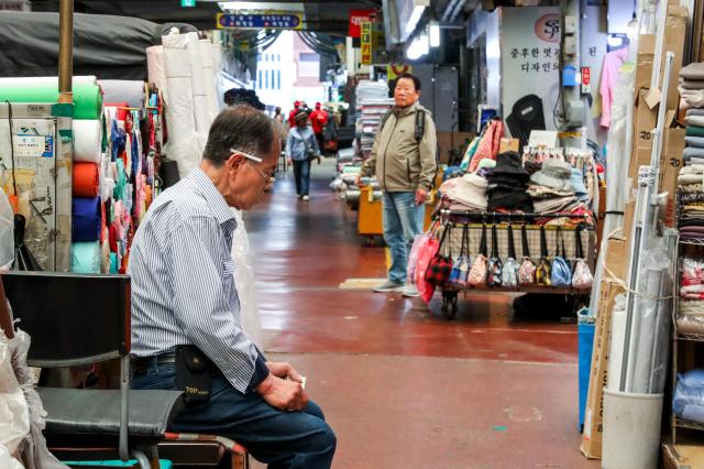 A vendor waits for customers at a traditional market in Jongno-gu Seoul June 4 2024 AJU PRESS Kim Dong-woo