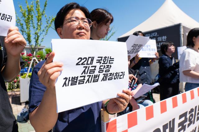 An activist from the South Korean Coalition for Anti-discrimination urges the 22nd National Assembly to enact the Anti-discrimination law at Yeoui-do Seoul on June 4 2024 AJU PRESS Park Jong-hyeok