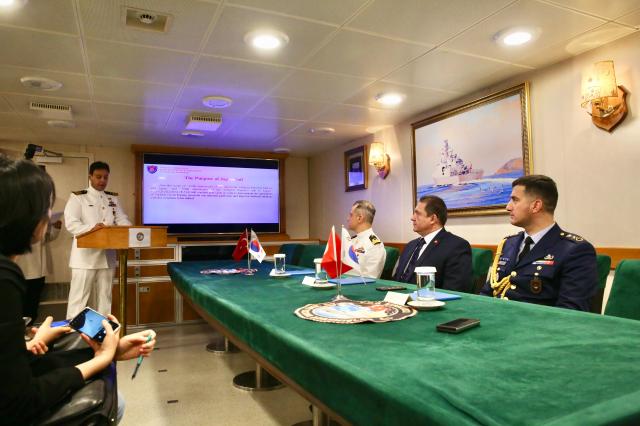 Turkish Embassy officials including Murat Tamer the Turkish Ambassador to the Republic of Korea second from right and Turkish Navy officers hold a press briefing in TCG Kinaliada on June 4 AJU PRESS Han Jun-gu