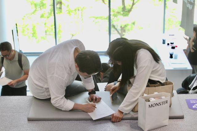 Visitors solve the Faker Exam at the Faker Temple in the HiKR Ground in central Seoul area on June 5th 2024 AJU PRESS Han Jun-gu