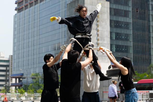 Green Korea United members perform guerrilla street performance Symbiosis expressing animal rights through body movements at Gwanghwamun Square in Jongno Seoul on June 5 2024 AJU PRESS Park Jong-hyeok