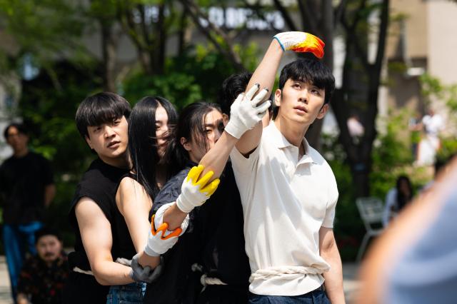 Green Korea United members perform guerrilla street performance Symbiosis expressing animal rights through body movements at Gwanghwamun Square in Jongno Seoul on June 5 2024 AJU PRESS Park Jong-hyeok