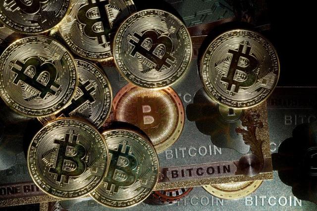 Representations of cryptocurrency Bitcoin are seen in this illustration picture taken in Paris France on March 9 2024 Reuters-Yonhap