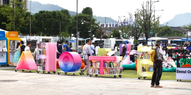 Bookcases shaped like the letters S E O U L are installed at the Seoul Outdoor Library event at Gwanghwamun Square on June 7 2024 AJU PRESS Han Jun-gu