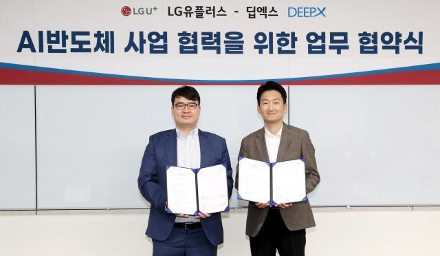 Yong-hyun Kwon head of LG Uplus enterprise division right and Lok-won Kim CEO of DeePX pose for a photograph after signing a partnership deal to develop on-device AI solutions at LG Uplus headquarters in Seoul on April 27 Courtesy of LG Uplus Corp