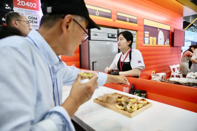 Visitors and participants experience booths from various countries at SEOUL FOOD 2024 held at KINTEX on June 11 2024AJU PRESS Han Jun-gu