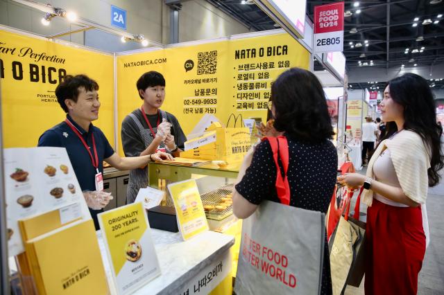 Visitors and participants experience booths from various countries at SEOUL FOOD 2024 held at KINTEX on June 11 2024AJU PRESS Han Jun-gu