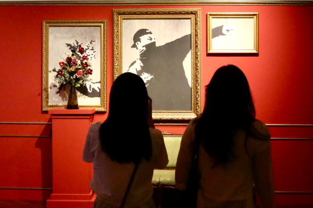 Visitors view the artworks at the REAL BANKSY BANKSY IS NOWHERE exhibition held at The Ground Seoul in central Seoul on June 17 2024 AJU PRESS Han Jun-gu