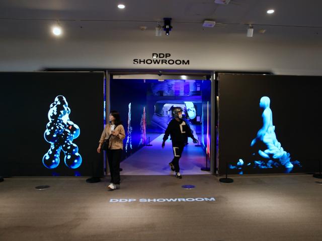 People walk through the corridor leading to the DDP Showroom on June 10 2024 AJU PRESS Han Jun-gu