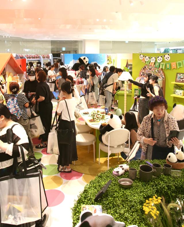 Visitors experience various goods and content at the Bao Family Pop-up Store Season 2 held at The Hyundai Seoul on June 20 2024 AJU PRESS Han Jun-gu