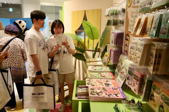 Visitors look at goods at the Bao Family Pop-up Store Season 2 held at The Hyundai Seoul on June 20 2024 AJU PRESS Han Jun-gu