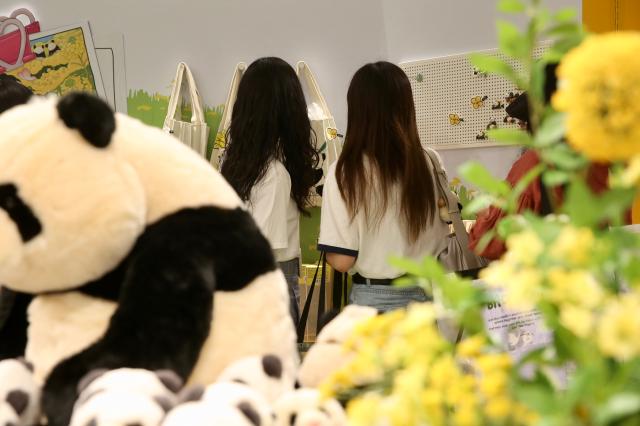 Visitors look at goods at the Bao Family Pop-up Store Season 2 held at The Hyundai Seoul on June 20 2024 AJU PRESS Han Jun-gu