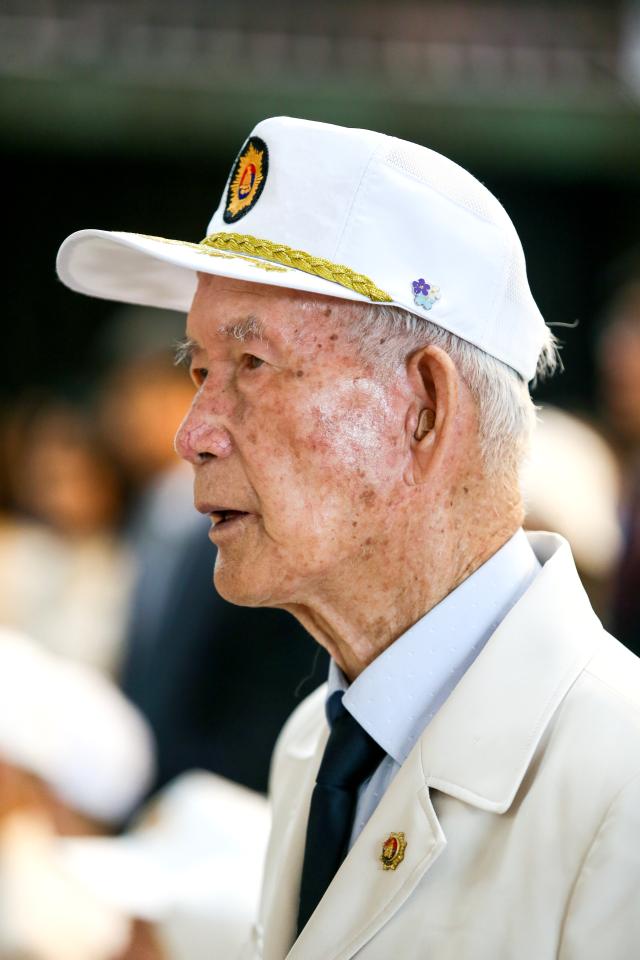 A Korean War veteran sings the national anthem during the opening ceremony of the We Have Not Forgotten Them exhibition at the War Memorial in Yongsan-gu Seoul on June 20 2024