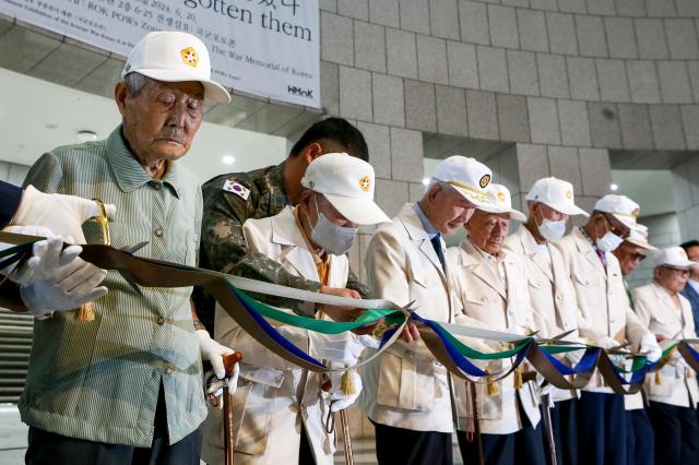 Korean War veterans attend a ribbon-cutting ceremony for the opening of the exhibition We Have Not Forgotten Them at the War Memorial Hall in Yongsan-gu Seoul on June 20 2024 AJU PRESS Kim Dong-woo