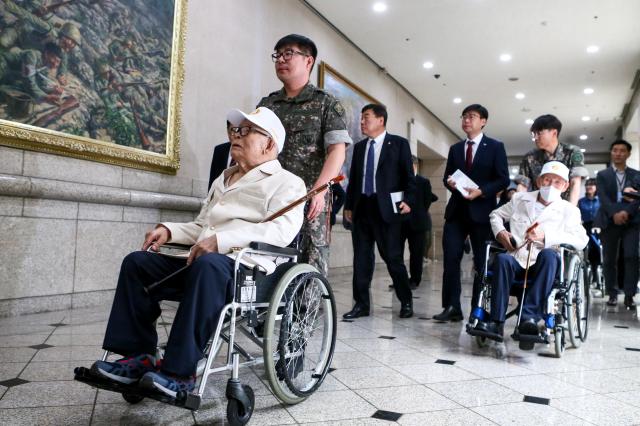 Korean War veterans attend the We Have Not Forgotten Them exhibition at the War Memorial Hall in Yongsan-gu Seoul on June 20 2024 AJU PRESS Kim Dong-woo