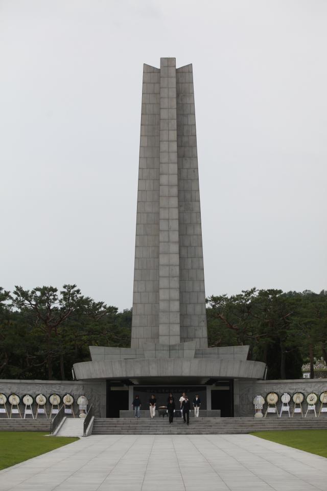 People walk out from the Memorial Tower at the Seoul National Cemetery in Seoul on June 25 2024 AJU PRESS Han Jun-gu