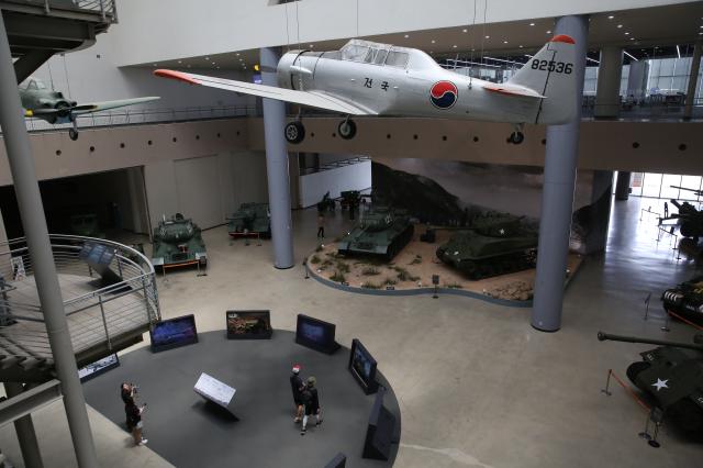 People view exhibitions of fighter jets and tanks at the War Memorial of Korea in Seoul on June 25 2024 AJU PRESS Han Jun-gu