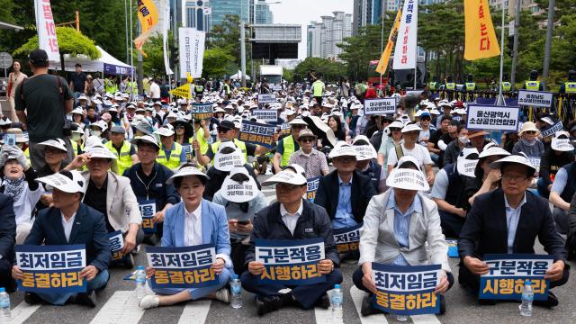 Small business owners rally demanding minimum wage reform National Assembly Seoul June 25 2024 AJU PRESS Park Jong-hyeok