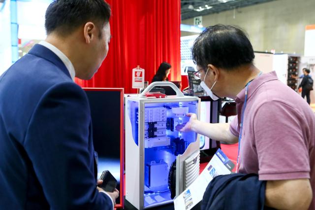 A visitor looks at an exhibit at Expo Solar  PV Korea 2024 at Expo Solar  PV Korea 2024 at KINTEX in Goyang west of Seoul on June 25 2024 AJU PRESS Kim Dong-woo