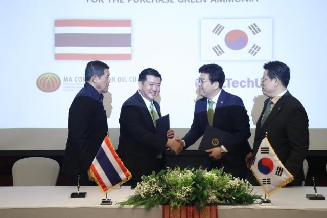 LTechUVC CEO Kim SE-ho third from left shakes hands with MA Corporation Oil Company Limited CEO Achirathorn Itthawoln second from left during the signing ceremony on June 25 2024 Courtesy of 