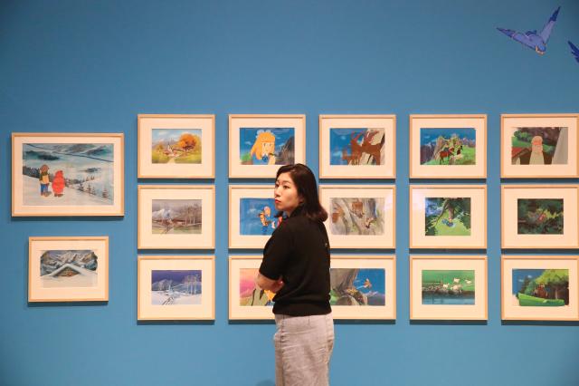 A visitor views exhibits at the Studio Ghibli - Isao Takahata Exhibition held at the Sejong Center in Seoul on June 26 2024 AJU PRESS Han Jun-gu