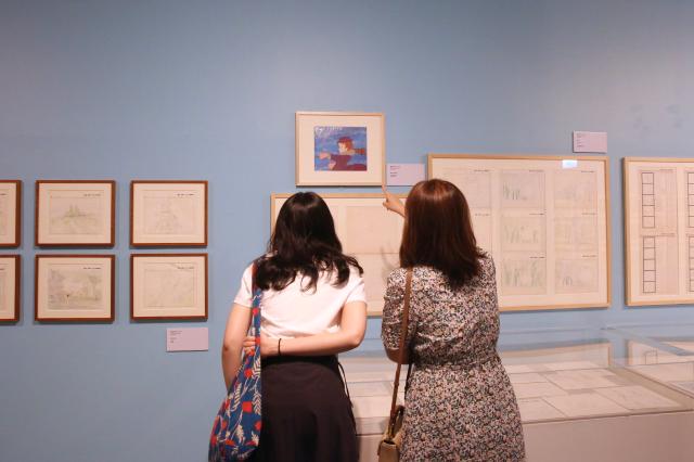 Visitors view the exhibits at the Studio Ghibli - Isao Takahata Exhibition at the Sejong Center in Seoul on June 26 2024 AJU PRESS Han Jun-gu