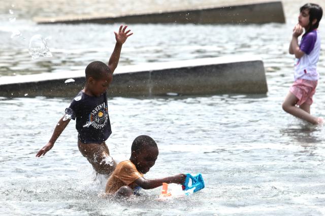 Kids play in the Cascade Fountain at Yeouido Hangang Park in Seoul on June 27 2024 AJU PRESS Han Jun-gu