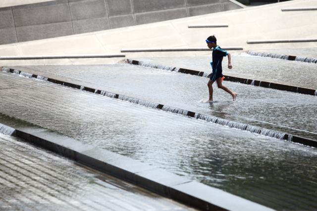 A kid runs through the Cascade Plaza at Yeouido Hangang Park in Seoul on June 27 2024 AJU PRESS Han Jun-gu